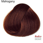 Rounded teardrop-shaped tuft of smooth, deep wine-brown hair beneath the shade name Mahogany, with the Radico Colour Me Organic logo at the lower right.