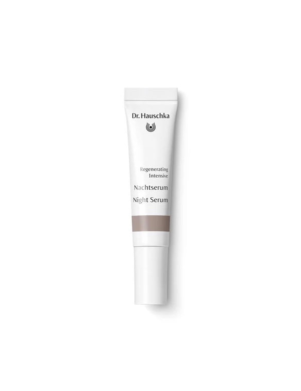 Small white Dr Hauschka Regenerating Night Serum Intensive tube with a long white cap, black lettering and a muted brown band.