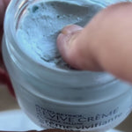 Hand taking blue Phyto-Retinol Revive Creme from the jar – Thrive Tallow Phyto-Retinol Revive Creme 50ml