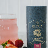 Ritua HYDRATE Berry with a prepared berry drink