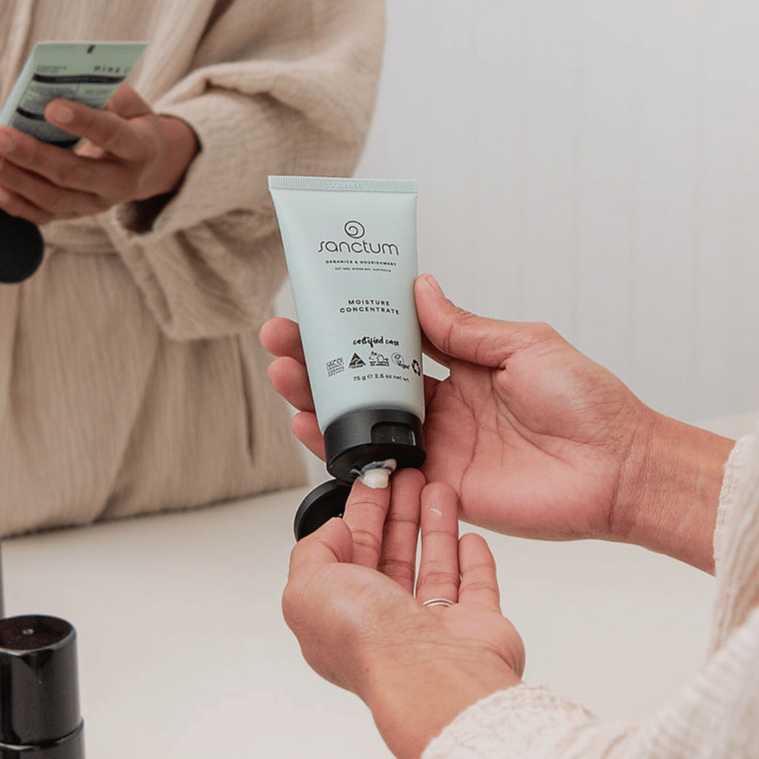 Sanctum Moisture Concentrate dispensed into a hand