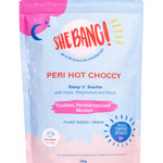 Pale blue and pink resealable She BANG! Peri Hot Choccy pouch with a bright pink patch at the top, a blue crescent moon, scattered white marks and bold red lettering.