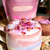 She BANG! Peri Rose & Vanilla Latte layered drink topped with rose petals