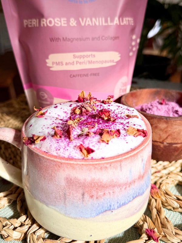 She BANG! Peri Rose & Vanilla Latte layered drink topped with rose petals