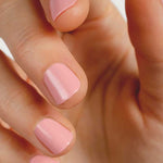 Close-up of natural nails wearing Sienna Byron Bay Peony nail polish in a soft pink shade.