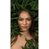Girl between leaves