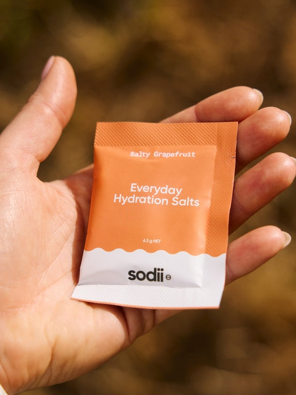 Sodii Everyday Hydration Salts Salty Grapefruit single serve held outdoors