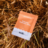 Sodii Everyday Hydration Salts Salty Grapefruit styled on natural straw