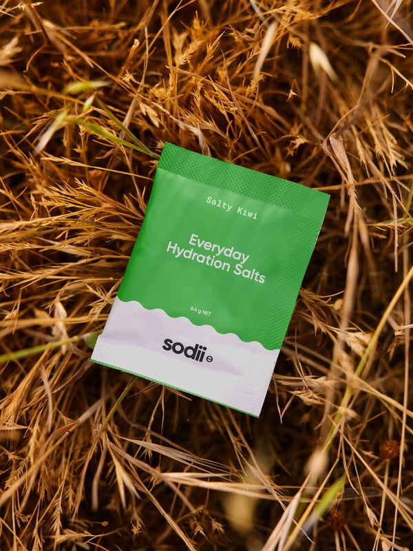 Sodii Everyday Hydration Salts Salty Kiwi styled on natural straw
