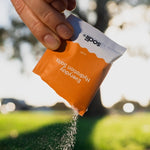 Sodii Everyday Hydration Salts Salty Mandarin being poured outdoors