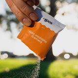 Sodii Everyday Hydration Salts Salty Mandarin being poured outdoors