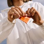 Sodii Everyday Hydration Salts Salty Mandarin sachet being opened