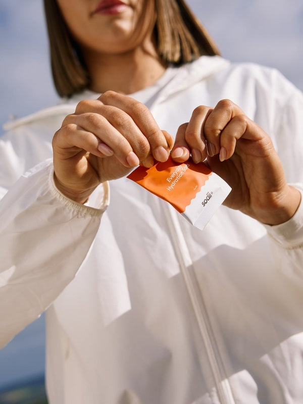 Sodii Everyday Hydration Salts Salty Mandarin sachet being opened