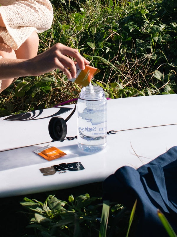 Sodii Everyday Hydration Salts Salty Mandarin being mixed after an outdoor activity