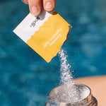 Sodii Everyday Hydration Salts Salty Pineapple being poured into a sports bottle