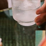 Sodii Salty Pineapple hydration salts being mixed into water
