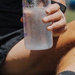 Sodii Salty Raspberry hydration drink being prepared outdoors