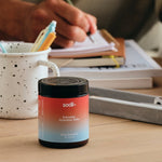 Sodii Everyday Hydration Salts Salty Grapefruit tub in a desk setting