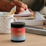 Sodii Everyday Hydration Salts Salty Grapefruit tub in a desk setting