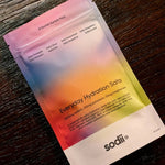 Sodii Everyday Hydration Salts Mixed Flavour sample pack styled on a timber surface