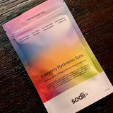 Sodii Everyday Hydration Salts Mixed Flavour sample pack styled on a timber surface