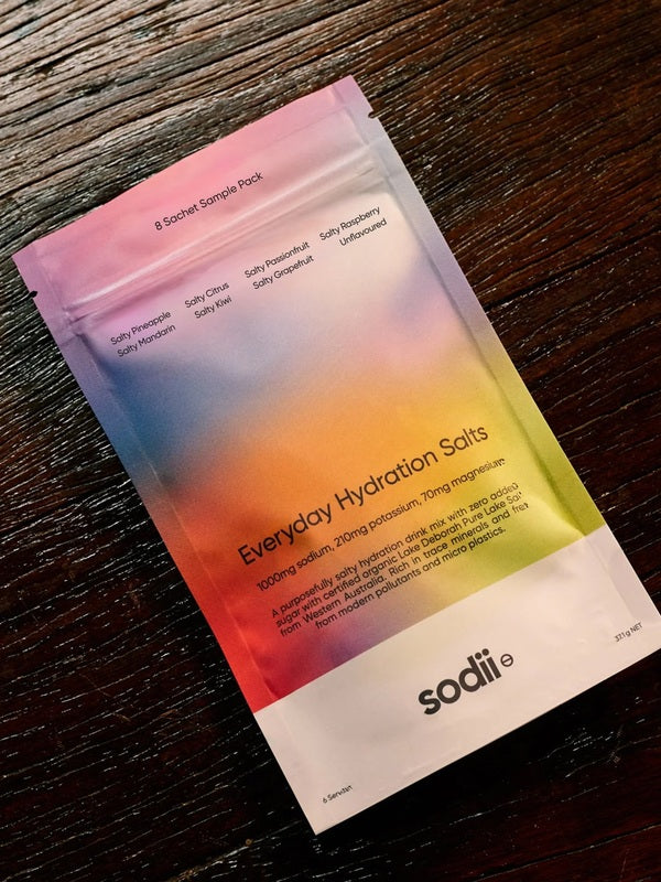 Sodii Everyday Hydration Salts Mixed Flavour sample pack styled on a timber surface