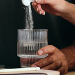 Sodii Unflavoured hydration salts being scooped into water