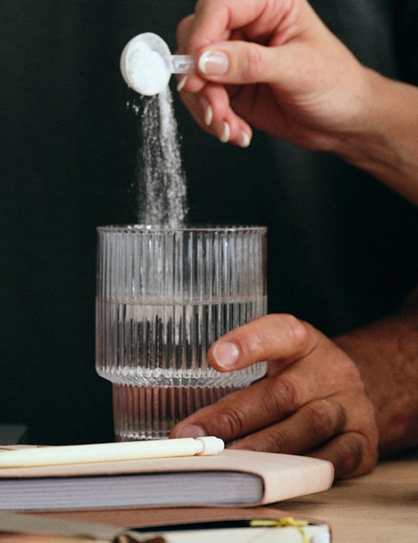 Sodii Unflavoured hydration salts being scooped into water