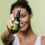 Botani Soothing Facial Mist 50ml — model holding soothing facial mist