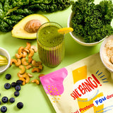 She BANG! Vanilla Peri Protein POWder styled with colourful fruit and drinks