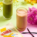 She BANG! Vanilla Peri Protein POWder styled with flowers and prepared drinks