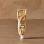Tinted Sun Balm tube in warm natural light – Thrive Tallow Tinted Sun Balm with Zinc 70ml