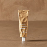 Tinted Sun Balm tube in warm natural light – Thrive Tallow Tinted Sun Balm with Zinc 70ml