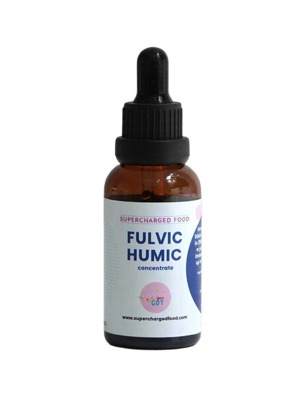 A brown glass dropper bottle labeled Supercharged Food Love Your Gut Fulvic Humic Concentrate 60ml with a black cap, designed to support gut health and microbiome balance, stands against a plain white background.