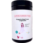 A black container of Supercharged Food Love Your Gut Organic Beef Liver Capsules (120 caps), featuring a label with a woman, a cat, and details like grass-fed, freeze-dried, B12, vitamin A, and made in Australia.
