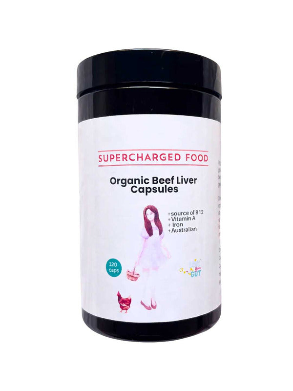 A black container of Supercharged Food Love Your Gut Organic Beef Liver Capsules (120 caps), featuring a label with a woman, a cat, and details like grass-fed, freeze-dried, B12, vitamin A, and made in Australia.