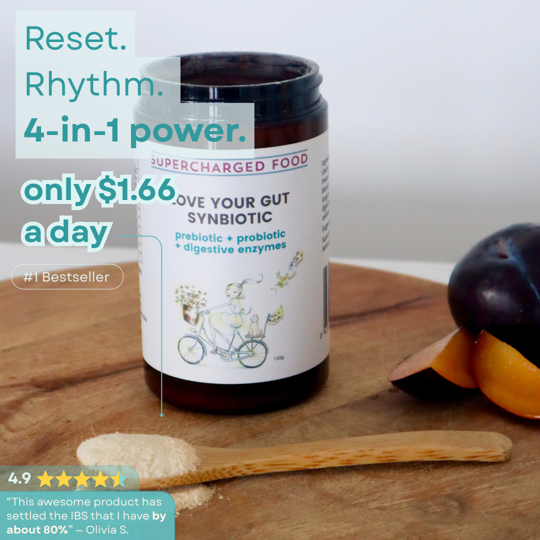 Love Your Gut Synbiotic styled with fruit and serving spoon on the official product page