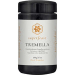 A black jar labeled Superfeast Tremella 100g features gold and white accents and "medicinal mushroom" on the side. It holds 100g of oral Tremella mushroom extract, promoted as a collagen alternative.