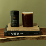 SuperFeast Neural Nectar beside a prepared tonic and books