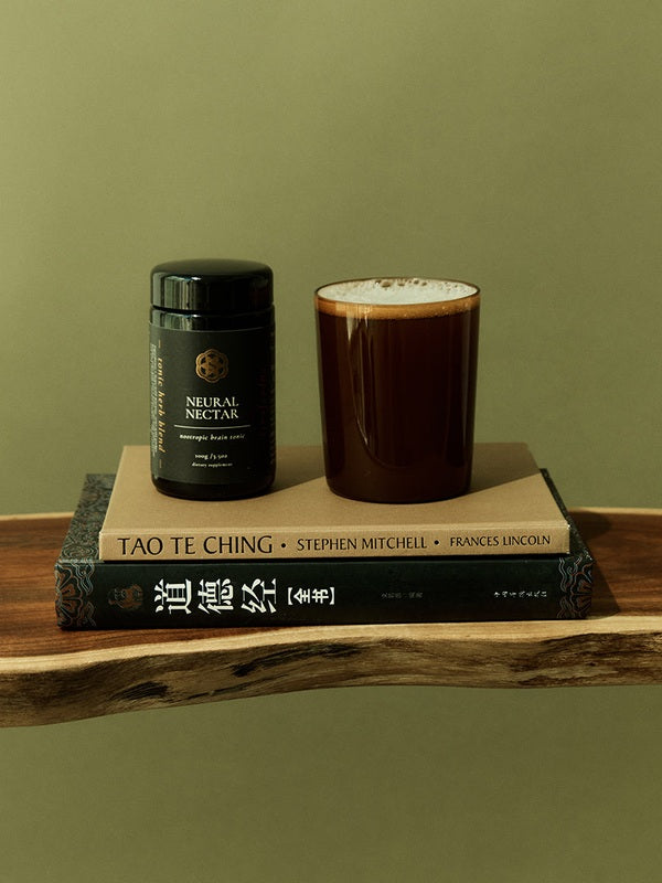 SuperFeast Neural Nectar beside a prepared tonic and books