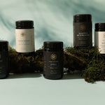 SuperFeast tonic range displayed with forest ingredients