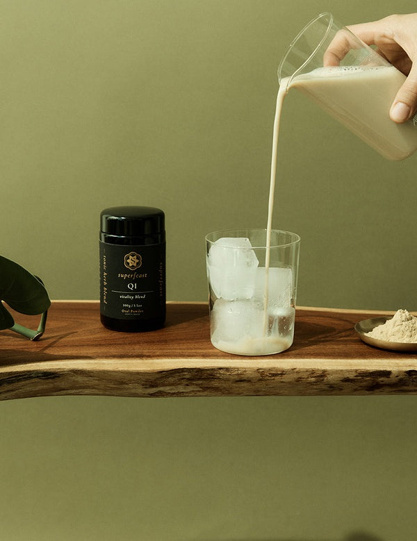 SuperFeast QI beside an iced tonic being prepared