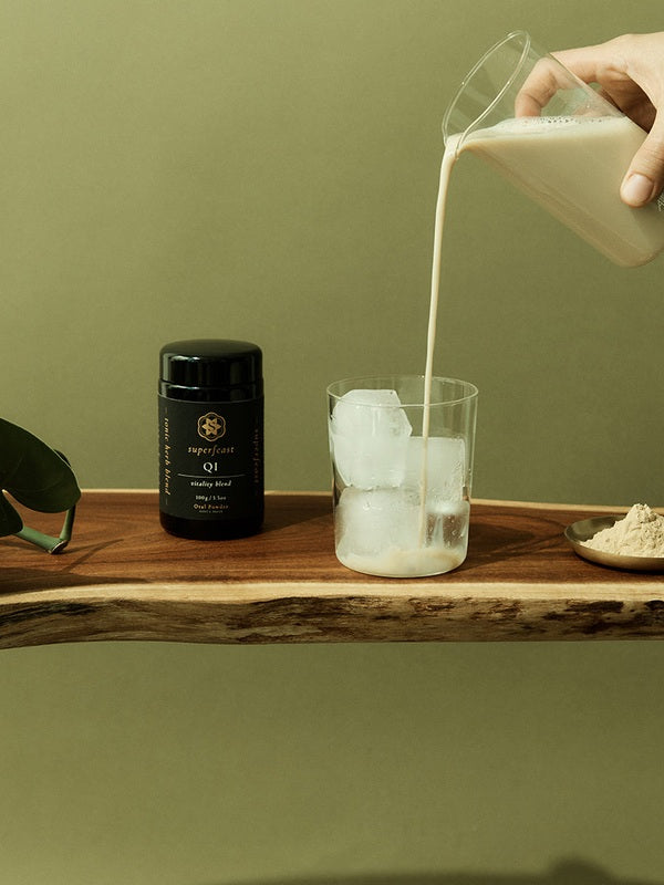 SuperFeast QI beside an iced tonic being prepared