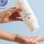 Sven's Island Manuka Kiss Gentle Barrier Body Wash being dispensed into a hand