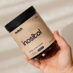 Switch Nutrition Inositol Powder held in hand