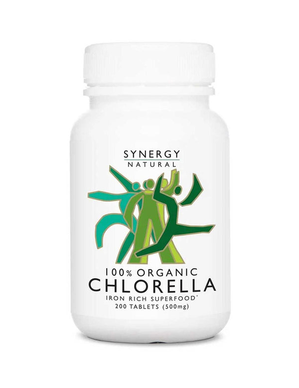 White Synergy Natural Organic Chlorella tablet bottle with rounded shoulders and a white screw cap, with green stylised figures above the black product name.