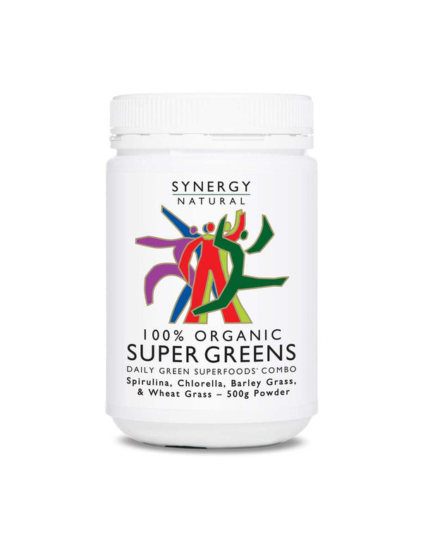 White Synergy Natural Organic Super Greens 500g powder tub with a broad white screw lid and colourful stylised figures above the bold black product name.