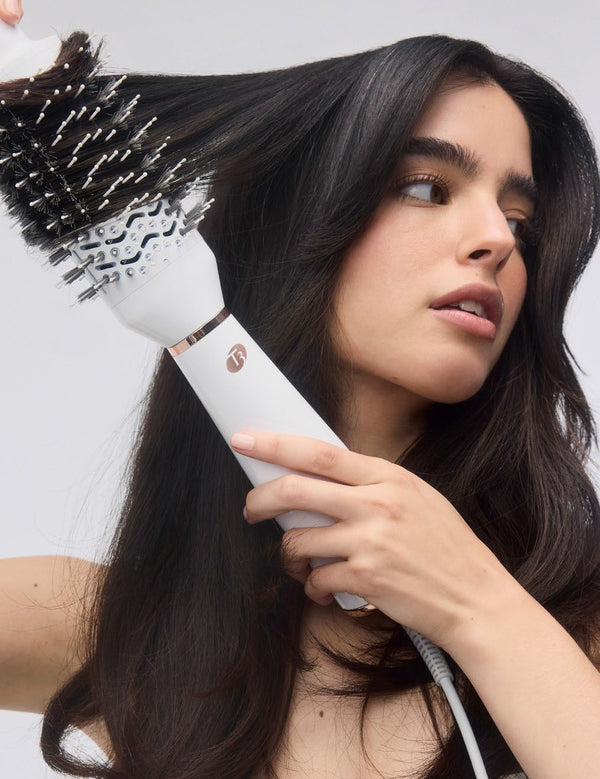 T3 AireBrush One-Step Hair Dryer Brush in use