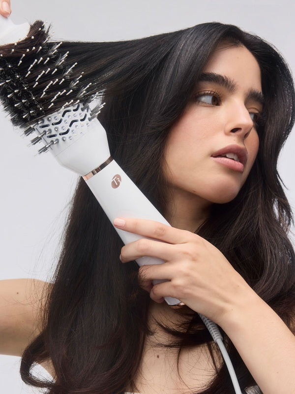 T3 AireBrush One-Step Hair Dryer Brush in use