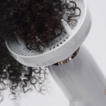 T3 Featherweight StyleMax Hair Dryer in use with diffuser